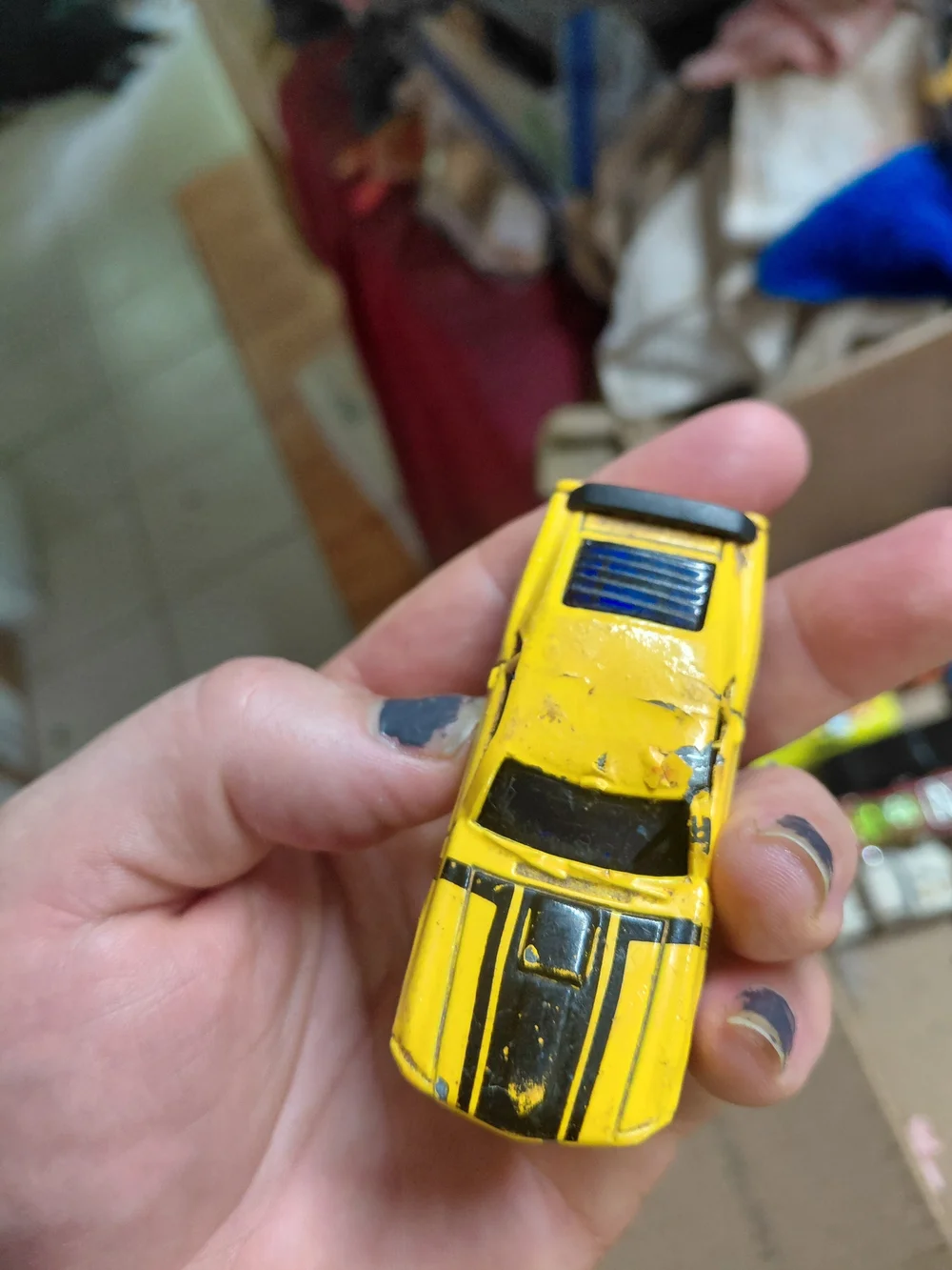1:64 scale die-cast model of a 1970 Ford Mustang Boss 302,
